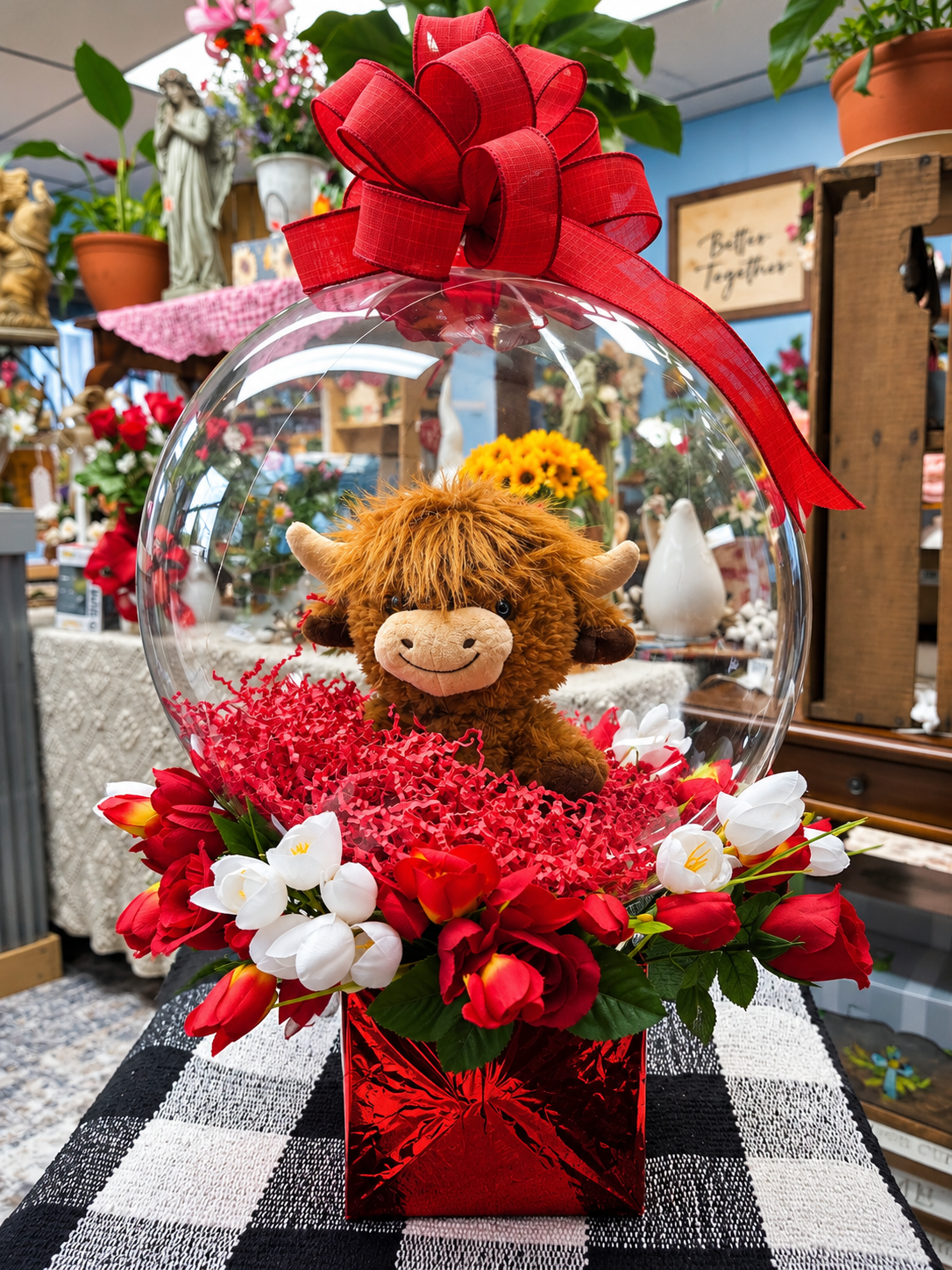 Stuffed animal in balloon –  Paoli Mercantile, Paoli IN